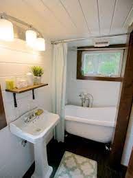 Another need to know — having a small bathroom does not mean you have to forfeit luxurious. 8 Tiny House Bathrooms Packed With Style Hgtv Tiny House Bathrooms House Bathroom Designs Tiny House Bathroom