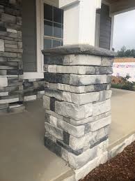 Stone veneer siding can enhance any home. Etl Aspen Gray Column Stone Veneer Exterior Exterior Stone Farmhouse Exterior Colors