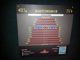 seating chart inside the door of the auditorium just in