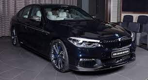 The vehicle is black sapphire metallic with a black interior. Carbon Black Bmw 5 Series Definitely Needed The M Performance Carbon Kit Carscoops
