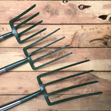 A garden fork, spading fork, digging fork or graip is a gardening implement, with a handle and several (usually four) short, sturdy tines. Forged Fork Bulldog Om S0