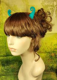 Matte Teal Curly Devil Horns Costume Accessory