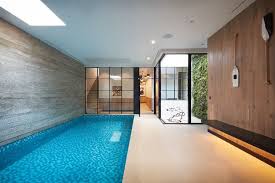 It S Hard To Believe You Re In The Basement Of A Chelsea Townhouse In This Light And Spacious Pool Room With Basement Pool Basement Remodeling Basement Stairs