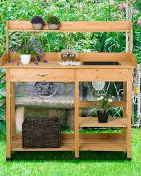 The convenience concepts deluxe potting bench with cabinet from planters and potts offers a convenient setup for outdoor work with plants. 20 Best Potting Benches Garden Work Benches With Storage