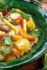 In a wide, heavy skillet, heat olive oil over medium heat and add garlic. Spicy Couscous Salad With Tomatoes Green Beans And Peppers Recipe Recipe Couscous Salad Peppers Recipes Best Salad Recipes