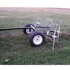 Dethatching & power raking are critical to having a great lawn. The Yard Tuff Pull Behind Dethatching Rake Turns Your Atv Or Lawn Tractor Into A Time Saving Labor Saving W Garden Tractor Attachments Tractors Small Tractors
