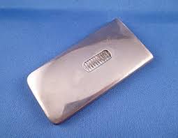 AN ANTIQUE NEEDHAM'S PATENT MECHANICAL VESTA CASE