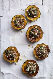 Quinoa Stuffed Acorn Squash With Cranberries And Feta Recipe Vegetarian Thanksgiving Recipes Recipes Easy Fall Dinner Recipes