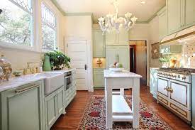 There's a round center island for preparing meals and a peninsula for the breakfast bar. 8 Narrow Kitchen Islands With Function To Spare