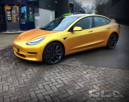 tesla gold wrap autoruit voertuigen