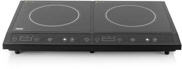 The first ones were quite unreliable with the control electronics frequently failing and they needed a lot of ventilation air to cool the igbt. Induction Cooker On A Wooden Table Seasoned Advice