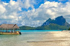 You'll jump from a minimum height of 10,000 feet, from a private plane, securely harnessed to your personal skydiving instructor. Mountain And Lagoon Of Bora Bora Mountains Landscape Tahiti Stock Footage Photos Videos Banque D Images