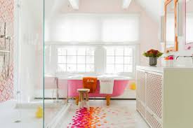 A bright modern bathroom with pink tile walls, a fuchsia floating vanity and orange frames is extra bold. 17 Cheerful Ideas To Decorate Functional Colorful Bathroom