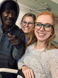 Civil Clinic students Sarah Hammond and Devon Fox visiting Adel and  learning some new rules in how how to play pool the Adel-way! Sarah and  Devon are Adel's student attorneys this semester.