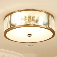 They create an effect called wall washing that makes a room look bigger too. Tammika Vintage Brass Drum Ceiling Lamps