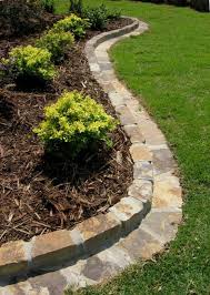 Downspout Water Run Off Keeps Mulch In Flower Bed Gardening Front Yard Landscaping Design Front Yard Landscaping Pathway Landscaping