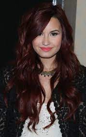 This style is a breeze if you want to combine bangs with longer curls. Demi Lovato Hairstyle Layered Long Wavy Haircut For Fall Hairstyles Weekly
