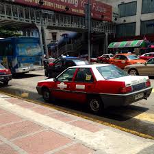 Taxi in kuala lumpur city is known as teksi. Taxi Only Get Into Taxis Like This That Say They Have Meters On The Door And Don T Allow Them To Haggle With Prices Before You Kuala Lumpur Taxi My Pictures