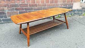 This coffee table mirrors features prominent within the windsor range. Mid Century Elm Coffee Table From Ercol 1969 For Sale At Pamono