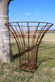 It would help support both cucumbers and squash. 25 Wrought Iron Cone Topiary Plant Support Round Trellis