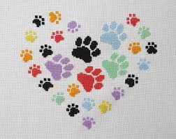 This is a christmas wreath stylized as a quiet holiday town. Paw Print Heart Cross Stitch Pattern Modern Gift For Dog Lover Cat Owner Rainbow Bridge Pet Memorial Girl Boy Baby Animal Chart Pdf Cross Stitch Heart Cross Stitching Cross Stitch Patterns