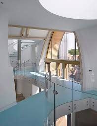 Download stock photography for use in web banners, social media content, and more. Contemporary Countryside Home With Oval Entrance And Interior Glazing