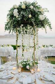 Fresh Ideas And Wedding Trends 2020 Wedding Ideas Tall Centerpiece With Greenery Wedding Centerpieces Flower Centerpieces Wedding Pretty Wedding Centerpieces