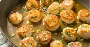 Les Noix De Saint Jacques Poelees Et Caramelisees Aux Agrumes Tasties Foods Recette Noix Noix De Saint Jacques Alimentation