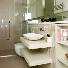 The bathroom is hidden off the kitchen, with a white sink, an oval shaped mirror with toilet. 30 Marvelous Small Bathroom Designs Leaves You Speechless