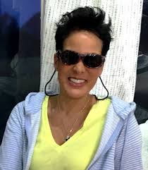 It's National Sunglasses day. This is a throwback pic. So question: do you  wear sunglasses? Yes or no.