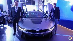 Hands up who thought theyõd ever be interested in an electric supercar? The All New Bmw I8 Coupe Gets More Efficient And A More Polished Interior Klgadgetguy