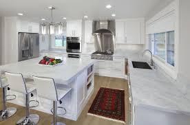 Style includes elegantly tapered legs, grooved sides, molded crown edged table top and brushed nickel rounded square knobs; Custom Kitchen And Dining Room Crystal Cabinets