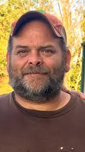 William "Bill" E. Huggins, 50