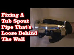 If your tub spout is hard to remove, you may need to use the end of a hammer or large wrench to help loosen while turning. Tub Spout Pipe Loose Behind Wall Youtube