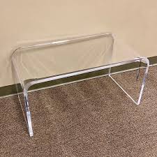 This transparent new surface floats in the room without taking up permanent visual residency. Modern Clear Acrylic Coffee Table Consign To Design Llc
