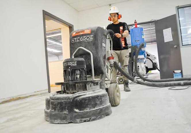 High-gloss polished industrial concrete floor treated with penetrating chemical sealer