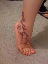 Ankle Tattoo Cherry Blossoms Flower Tattoo On Ankle Blossom Tattoo Ankle Tattoo Designs