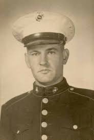 My dad. Corporal Raymond Donohue, USMC. He passed away two years ago. The  more recent picture was his last Veteran's Day, enjoying his free meal at  Applebees. Miss him every day.