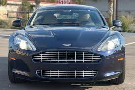 Image result for Slate Blue 2011 Aston Martin