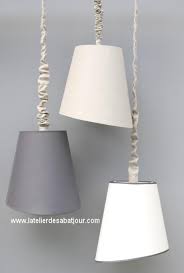 • structure en métal époxy blanc recouverte d'une feuille de polypropylène et d'un tissu chintz, 100% coton • ganse ton sur ton. Suspension Design Asymetrique A L Atelier Des Abat Jour A Vannes