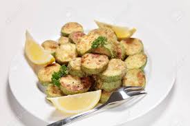 Check spelling or type a new query. Sauteed Courgette Zucchini Slices Served With Lemon Wedges Stock Photo Picture And Royalty Free Image Image 17478726