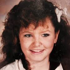 Can someone repair this water damaged photo of my sister? Also, can you fix  the scar that around her right eye? (looking at the photo the scar