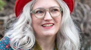 Troy teacher, author pens aquarium-themed book to boost children's reading  confidence