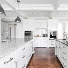 Look for mirrored kitchen island ideas to stretch space. Double Kitchen Islands Design Ideas