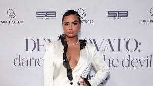 Demi lovato marked the april 2 release of album dancing with the devil by dropping the music video for her single of the same name, which shows her singing from a hospital bed. Demi Lovato Promiflash De