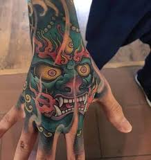 Spiked mace tattoo on the hand. Top 41 Badass Hand Tattoos For Men 2021 Inspiration Guide