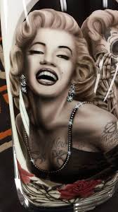 For Robyn of Cedar Rapids-Marilyn Monroe "Love now Cry later" portraits n  "tattoos" airbrushed alongside with roses n stems/thorns/skulls...on front  fender HD