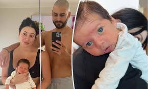 Martha Kalifatidis and Michael Brunelli share footage of their newborn  catching his first flight