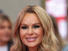 BGT's Amanda Holden is an absolute goddess in plunging metallic dress