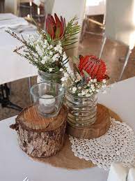 Rustic Stumps As Wedding Centrepieces With Australia Native Flowers Rustic Wedding Table Setting Wedding Table Decorations Flower Centerpieces Wedding